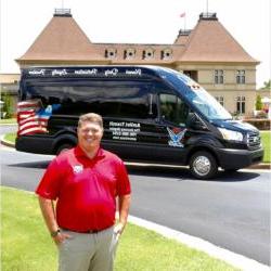 Theodore Sosebee with AVT Van in background.